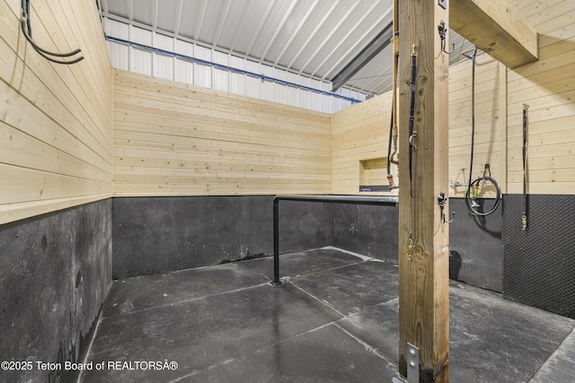 2399 Chapel Rd, Swan Valley, ID 83449 - detailed view of wooden walls and unfinished concrete flooring
