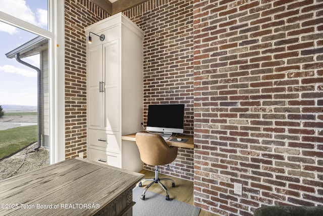 2399 Chapel Rd, Swan Valley, ID 83449 - office featuring brick wall and wood finished floors