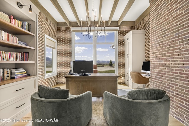 2399 Chapel Rd, Swan Valley, ID 83449 - office space with brick wall, a chandelier, light wood finished floors, and beam ceiling