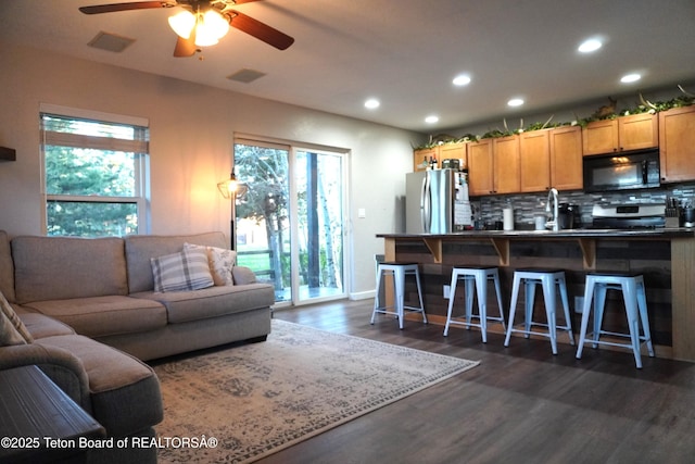 418 Par Ave, Pinedale, WY 82941 - living area featuring recessed lighting, a ceiling fan, and dark wood finished floors