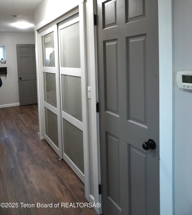 418 Par Ave, Pinedale, WY 82941 - hallway featuring dark wood-style floors and baseboards