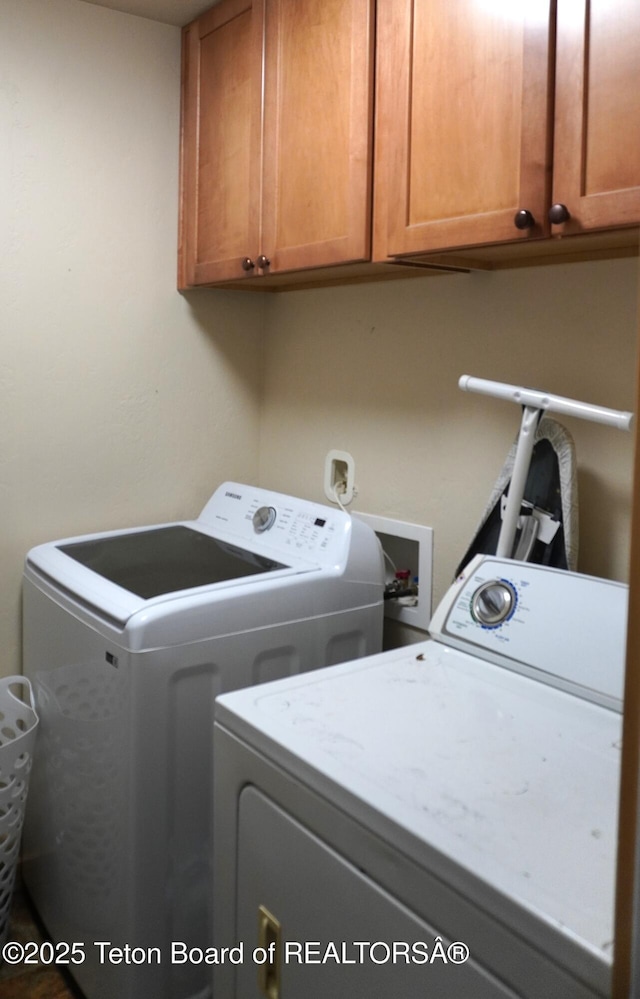 418 Par Ave, Pinedale, WY 82941 - laundry room with cabinet space and independent washer and dryer