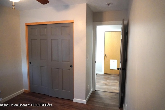 418 Par Ave, Pinedale, WY 82941 - hallway featuring baseboards and dark wood finished floors
