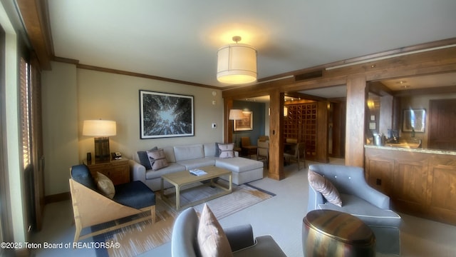 7680 Granite Loop Rd Unit 655, Teton Village, WY 83025 - living area featuring crown molding and carpet flooring