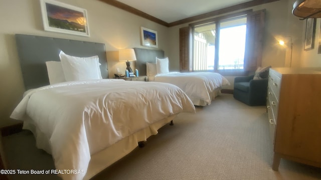 7680 Granite Loop Rd Unit 655, Teton Village, WY 83025 - carpeted bedroom with crown molding