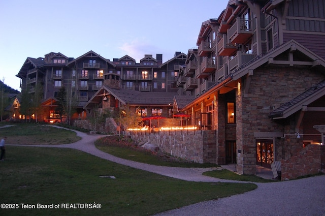 7680 Granite Loop Rd Unit 655, Teton Village, WY 83025 - view of community featuring a yard
