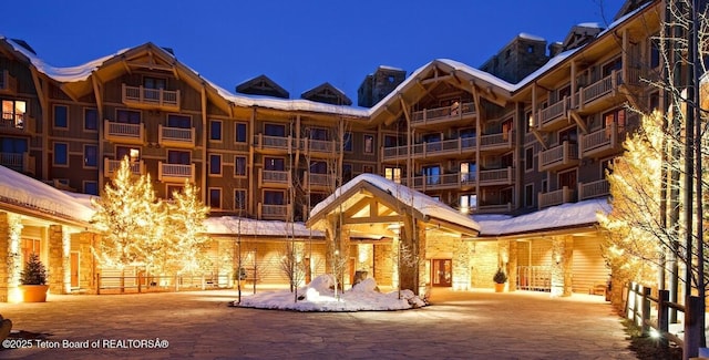 7680 Granite Loop Rd Unit 655, Teton Village, WY 83025 - snow covered building with a view of apartment building / complex
