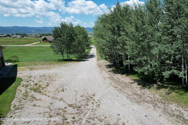216 County Road 179s, Thayne, WY 83127 - view of street featuring a mountain view and a rural view