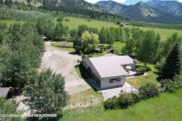 216 County Road 179s, Thayne, WY 83127 - aerial view of sparsely populated area with a mountainous background