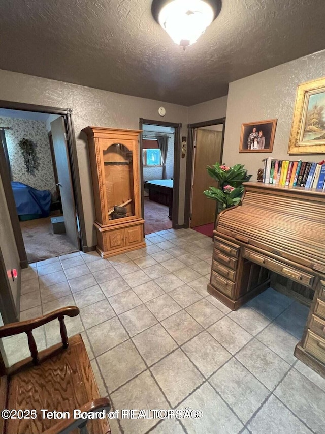 216 County Road 179s, Thayne, WY 83127 - office space with a textured ceiling, a textured wall, and light tile patterned floors