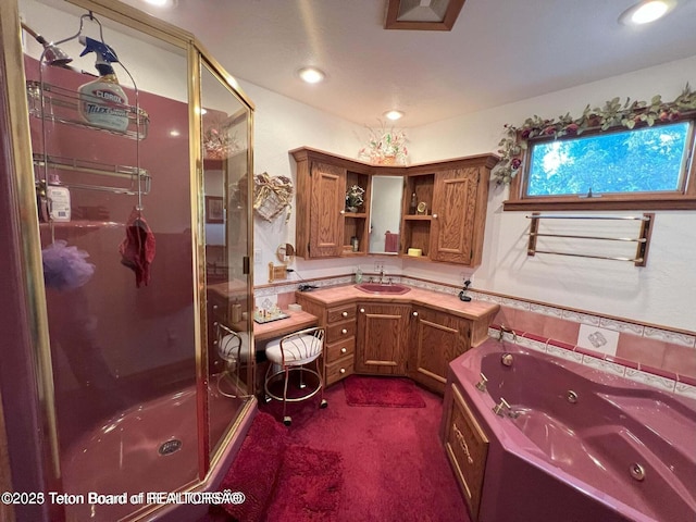 216 County Road 179s, Thayne, WY 83127 - full bathroom with a stall shower, a jetted tub, vanity, and recessed lighting