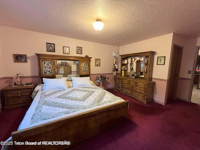 216 County Road 179s, Thayne, WY 83127 - carpeted bedroom with a textured ceiling