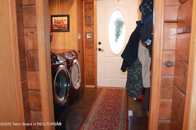 588 S Oak St, Labarge, WY 83123 - laundry area featuring washer and clothes dryer and wood walls