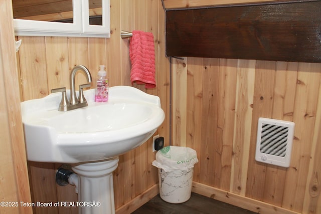 588 S Oak St, Labarge, WY 83123 - bathroom with heating unit and wooden walls