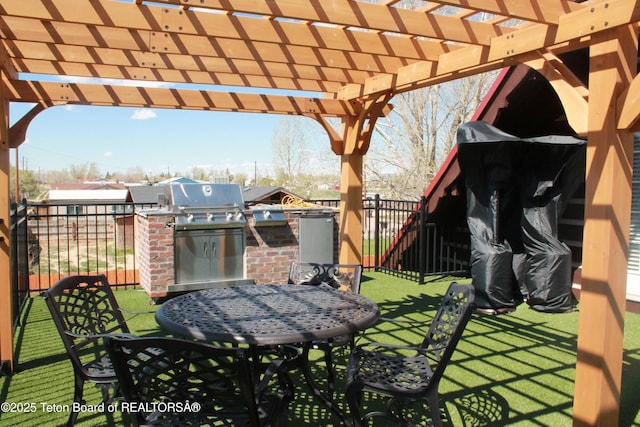 588 S Oak St, Labarge, WY 83123 - view of patio with area for grilling, outdoor dining space, and a pergola