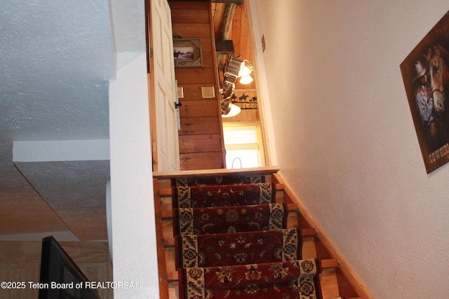 588 S Oak St, Labarge, WY 83123 - staircase with a textured wall and baseboards