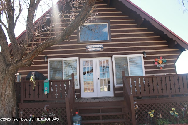 588 S Oak St, Labarge, WY 83123 - property entrance with a wooden deck and french doors
