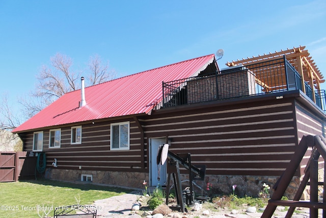 588 S Oak St, Labarge, WY 83123 - back of property with a balcony and metal roof
