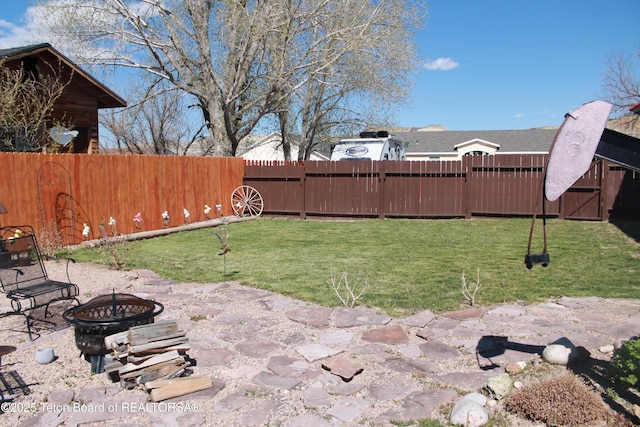 588 S Oak St, Labarge, WY 83123 - view of yard featuring an outdoor fire pit