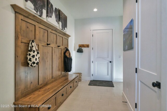 358 Solitude Ln, Tetonia, ID 83452 - mudroom featuring baseboards, light tile patterned floors, and recessed lighting