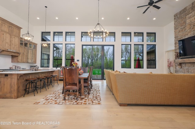 358 Solitude Ln, Tetonia, ID 83452 - dining room with a chandelier, light wood-type flooring, recessed lighting, and a ceiling fan