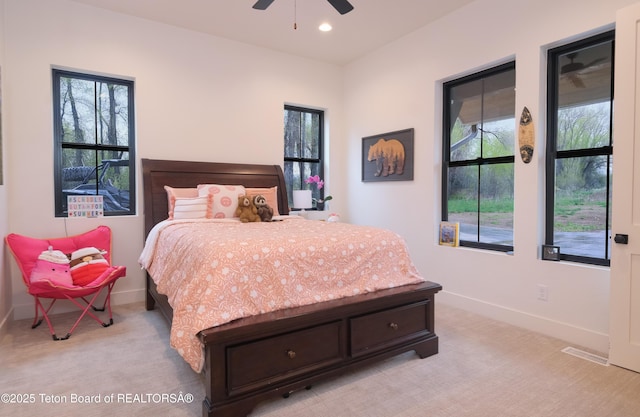 358 Solitude Ln, Tetonia, ID 83452 - bedroom featuring light colored carpet, multiple windows, baseboards, recessed lighting, and a ceiling fan
