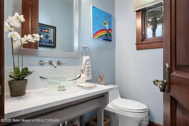 62 Hastings Dr, Victor, ID 83455 - half bath featuring toilet and vanity