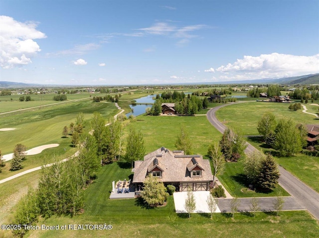 62 Hastings Dr, Victor, ID 83455 - aerial view of property and surrounding area featuring a nearby body of water and a golf course