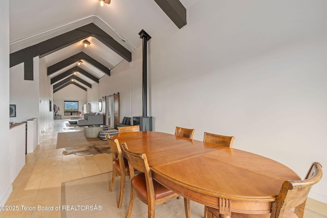 6827 S 1750 W, Victor, ID 83455 - dining space with beam ceiling, high vaulted ceiling, and light tile patterned floors