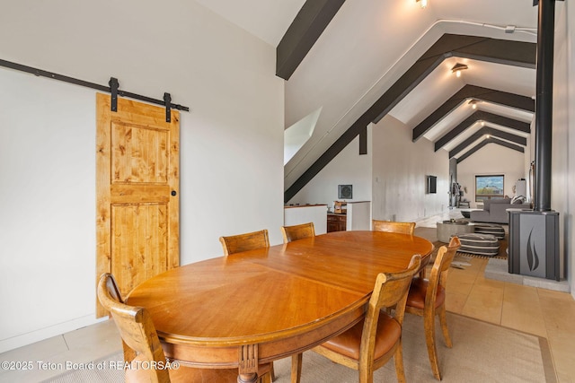 6827 S 1750 W, Victor, ID 83455 - dining space with light tile patterned floors and a barn door