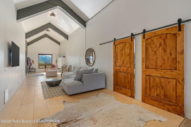 6827 S 1750 W, Victor, ID 83455 - living area with a barn door, light tile patterned floors, beam ceiling, high vaulted ceiling, and baseboards