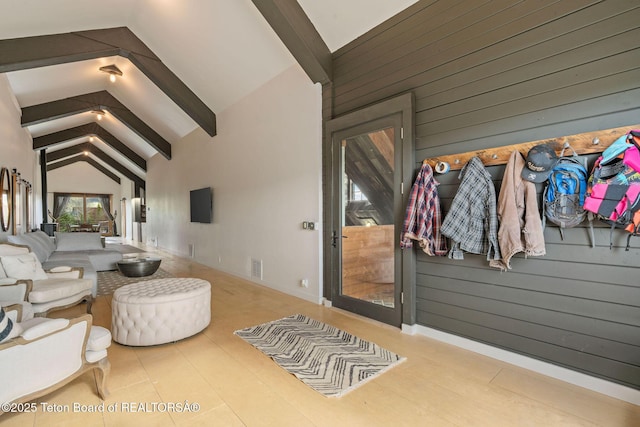 6827 S 1750 W, Victor, ID 83455 - living area with wood walls, beam ceiling, and high vaulted ceiling
