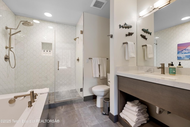 150 W Simpson Ave Unit 405, Jackson, WY 83011 - full bathroom with toilet, a bathtub, vanity, a stall shower, and tile patterned floors