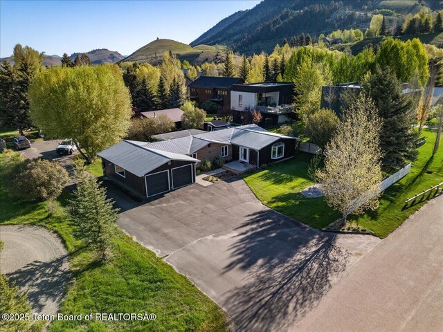 755 Cache Creek Dr, Jackson, WY 83001 - view of subject property featuring a mountain backdrop