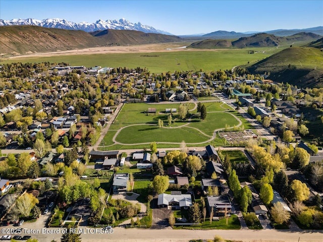 755 Cache Creek Dr, Jackson, WY 83001 - aerial overview of property's location featuring mountains