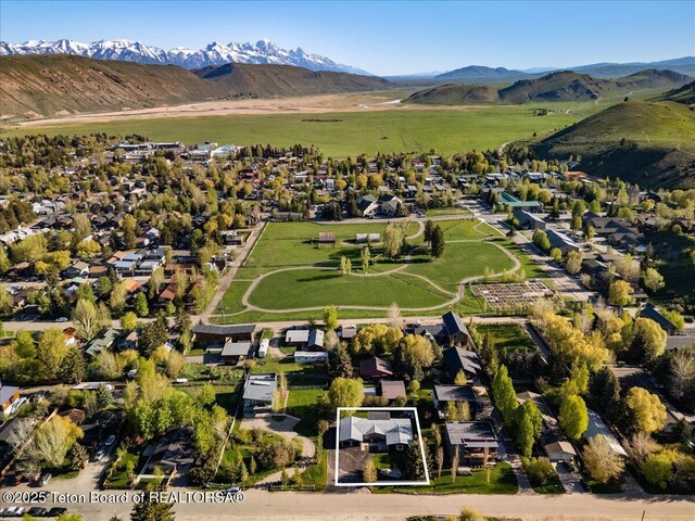 755 Cache Creek Dr, Jackson, WY 83001 - aerial overview of property's location with mountains and property boundaries highlighted