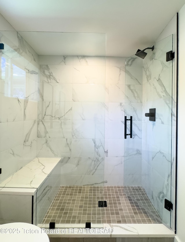 755 Cache Creek Dr, Jackson, WY 83001 - full bath featuring a marble finish shower and toilet