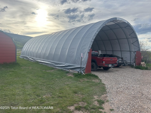 522 El Clark Ln, Smoot, WY 83126 - view of outdoor structure with a carport and driveway