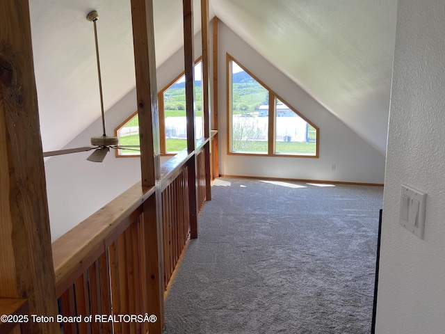 522 El Clark Ln, Smoot, WY 83126 - additional living space with lofted ceiling, carpet, and ceiling fan