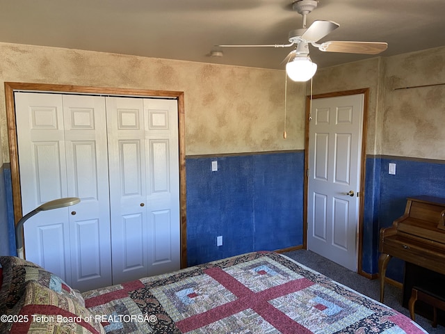 522 El Clark Ln, Smoot, WY 83126 - unfurnished bedroom featuring a closet, a ceiling fan, and carpet floors