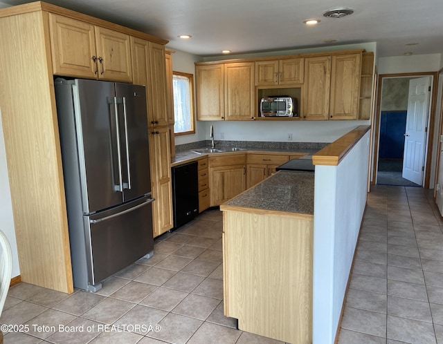 522 El Clark Ln, Smoot, WY 83126 - kitchen with appliances with stainless steel finishes, light tile patterned floors, dark countertops, open shelves, and recessed lighting