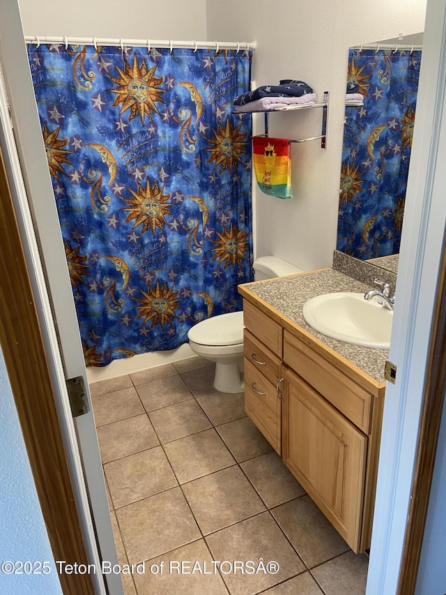 522 El Clark Ln, Smoot, WY 83126 - bathroom with tile patterned flooring, vanity, and a shower with curtain