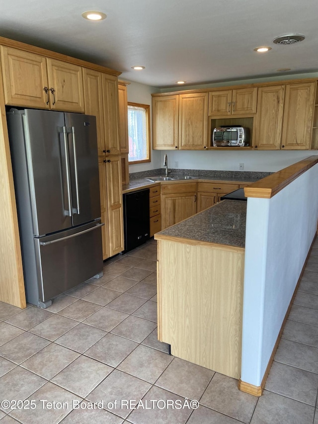 522 El Clark Ln, Smoot, WY 83126 - kitchen featuring stainless steel appliances, light tile patterned flooring, and recessed lighting