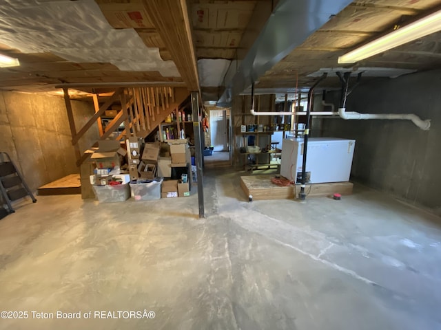 522 El Clark Ln, Smoot, WY 83126 - unfinished basement featuring stairs