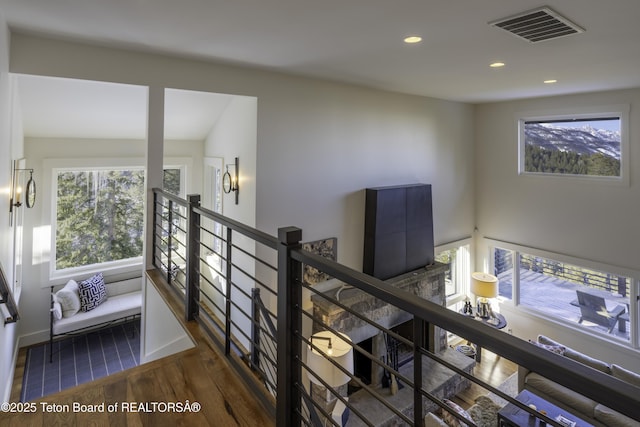 6960 Lupine Trl, Wilson, WY 83001 - stairway with plenty of natural light, wood finished floors, and recessed lighting