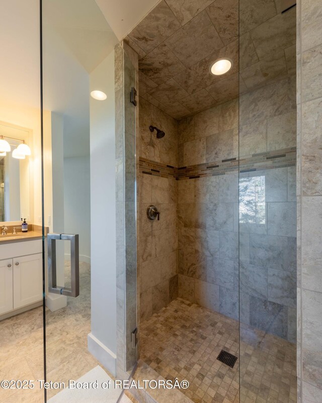 6960 Lupine Trl, Wilson, WY 83001 - bathroom featuring a shower stall and vanity