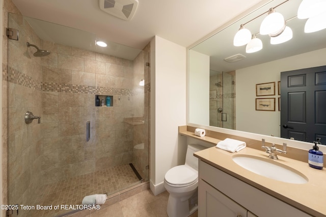 6960 Lupine Trl, Wilson, WY 83001 - full bath featuring toilet, a shower stall, vanity, and tile patterned flooring