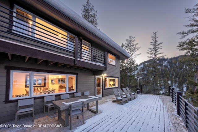 6960 Lupine Trl, Wilson, WY 83001 - snow covered deck with outdoor dining space