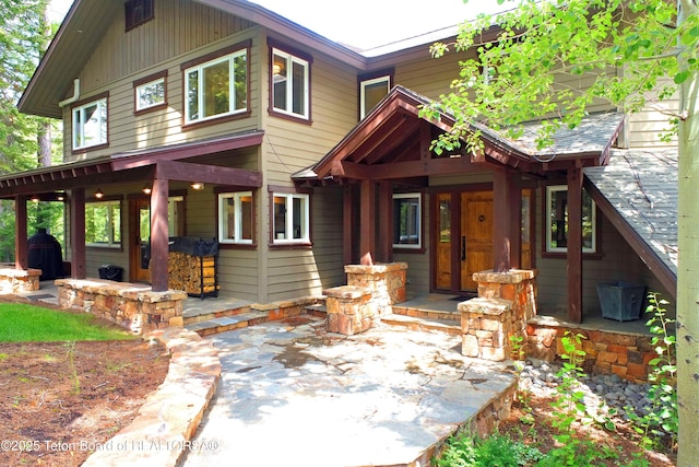 6960 Lupine Trl, Wilson, WY 83001 - view of front of home with a patio area