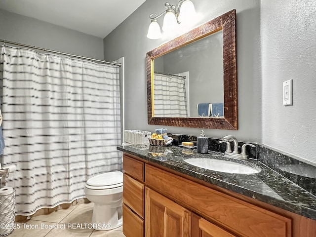 33 Wagon Rut Ln, Auburn, WY 83111 - bathroom featuring vanity, tile patterned floors, toilet, and curtained shower